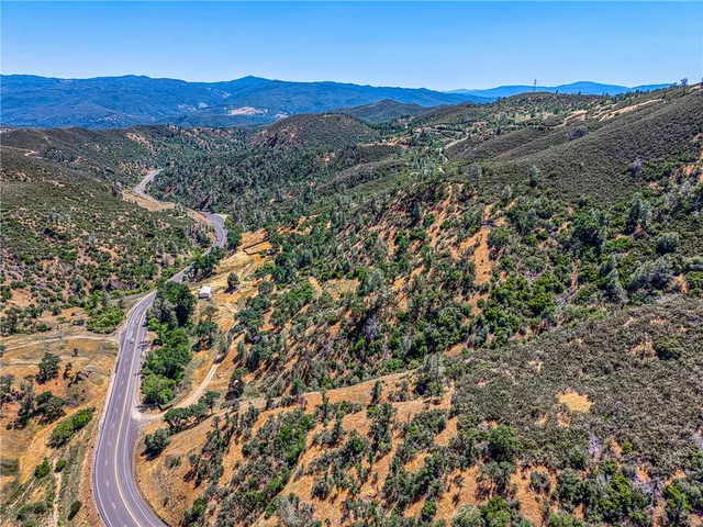 a view of a city with mountains in the background