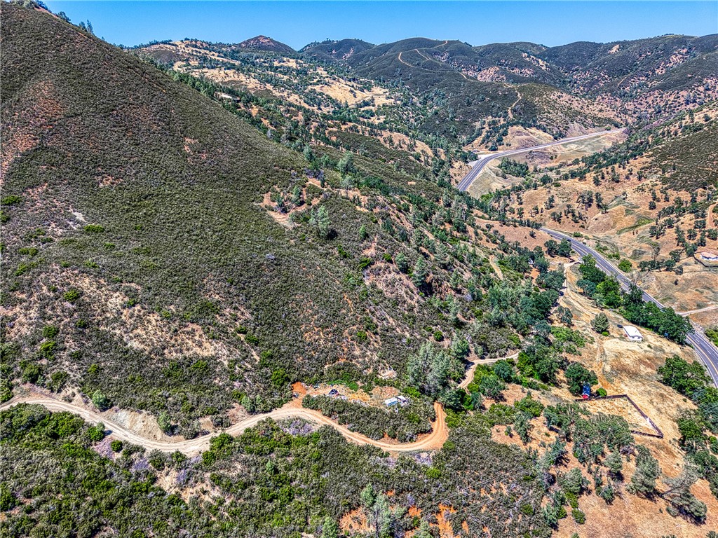 104 Mule Skinner Road Clearlake Oaks, CA 95423 - Photo 16 of 25 an aerial view of residential house and green space
