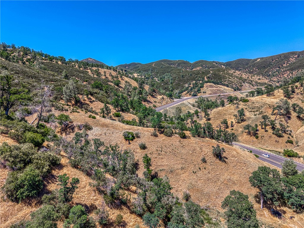 104 Mule Skinner Road Clearlake Oaks, CA 95423 - Photo 24 of 25 a view of a mountain with mountains in the background