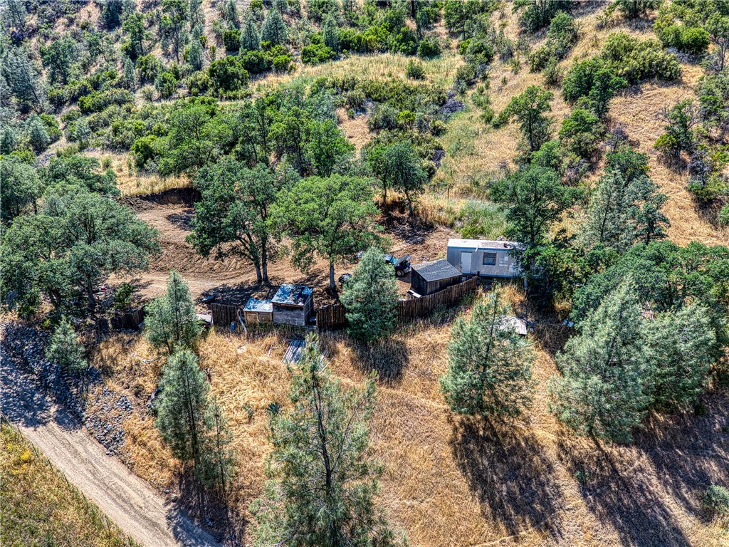 104 Mule Skinner Road Clearlake Oaks, CA 95423 - Photo 4 of 25 an aerial view of a house with a yard