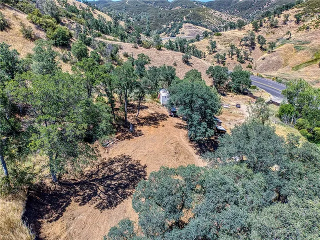 an aerial view of city and lake