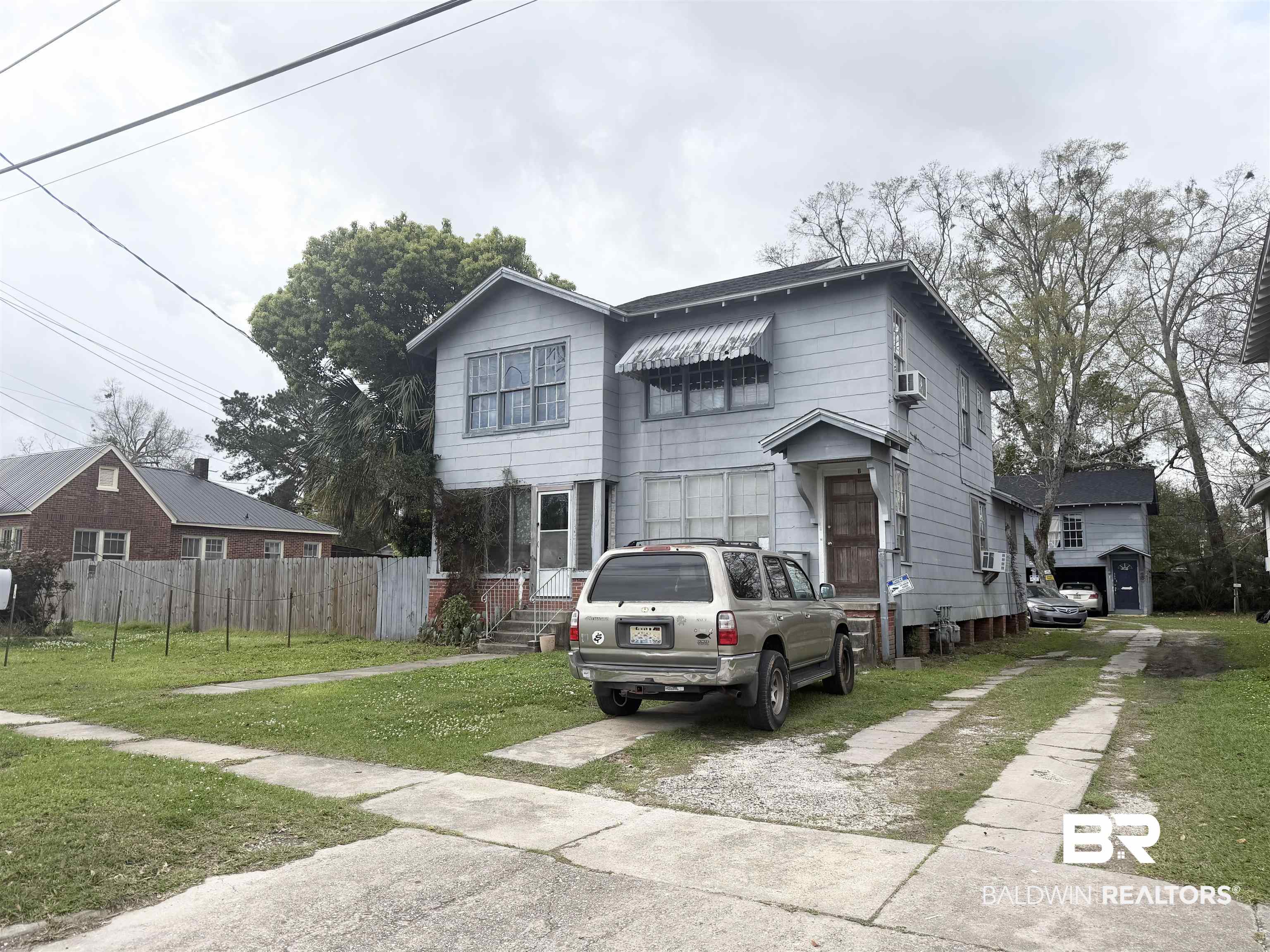 266 Rickarby Street Mobile, AL 36606 - Photo 1 of 4 View of front of home with cooling unit