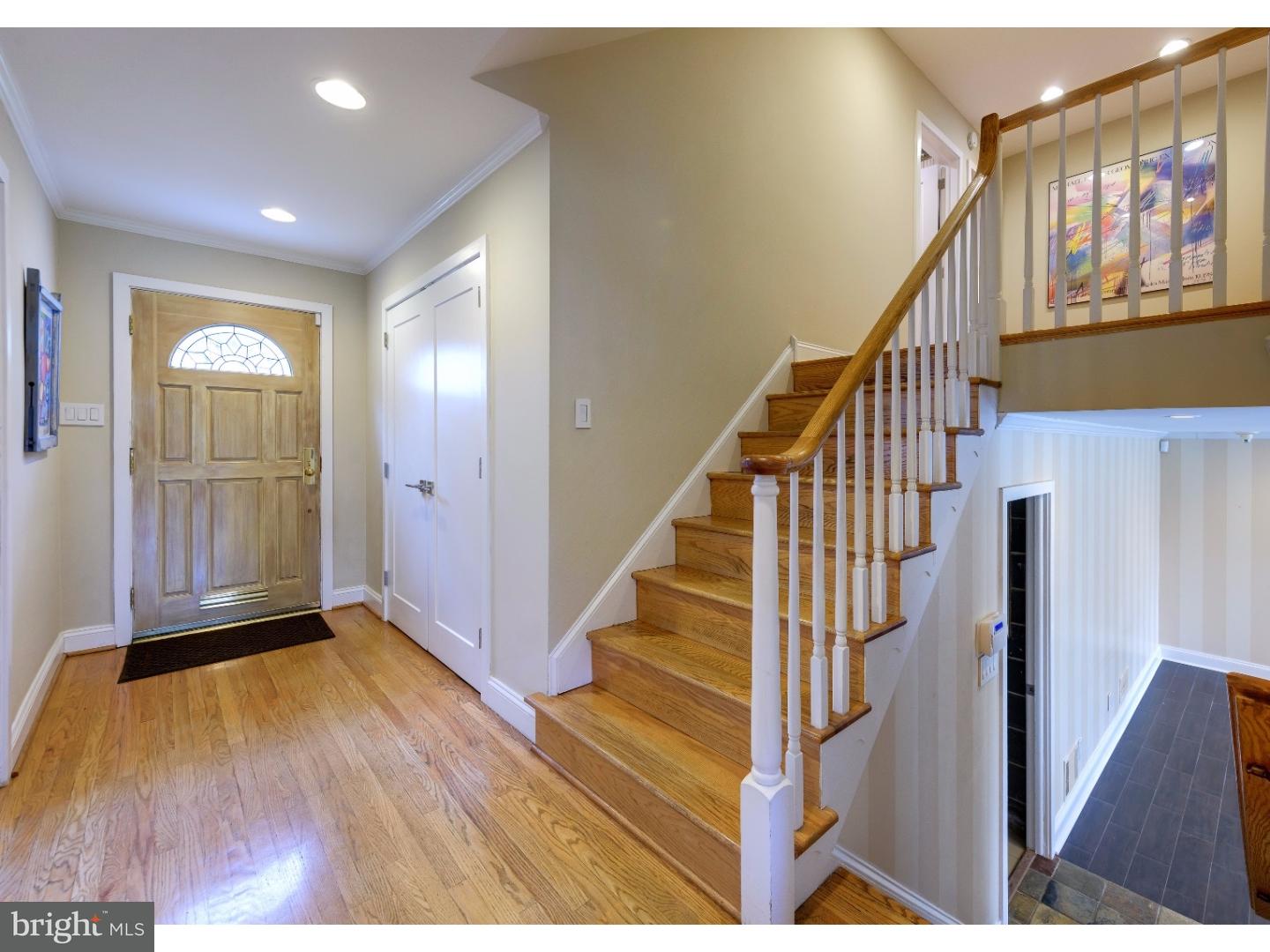 1935 County Line Road Villanova, PA 19085 - Photo 3 of 25 a view of entryway with wooden floor and stairs