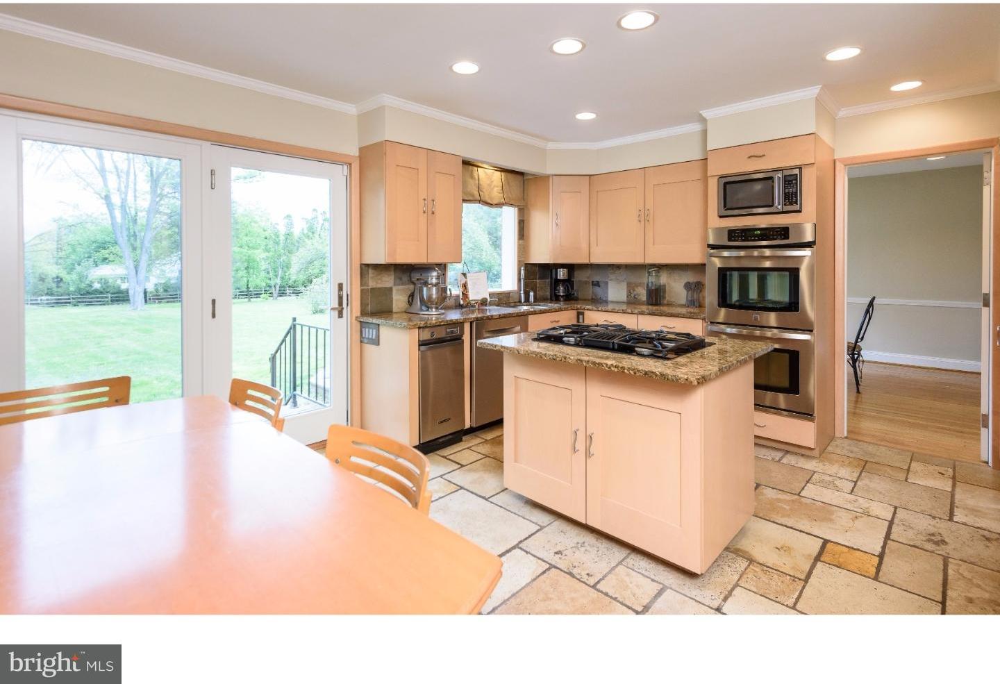1935 County Line Road Villanova, PA 19085 - Photo 7 of 25 a kitchen with a stove a sink and a microwave