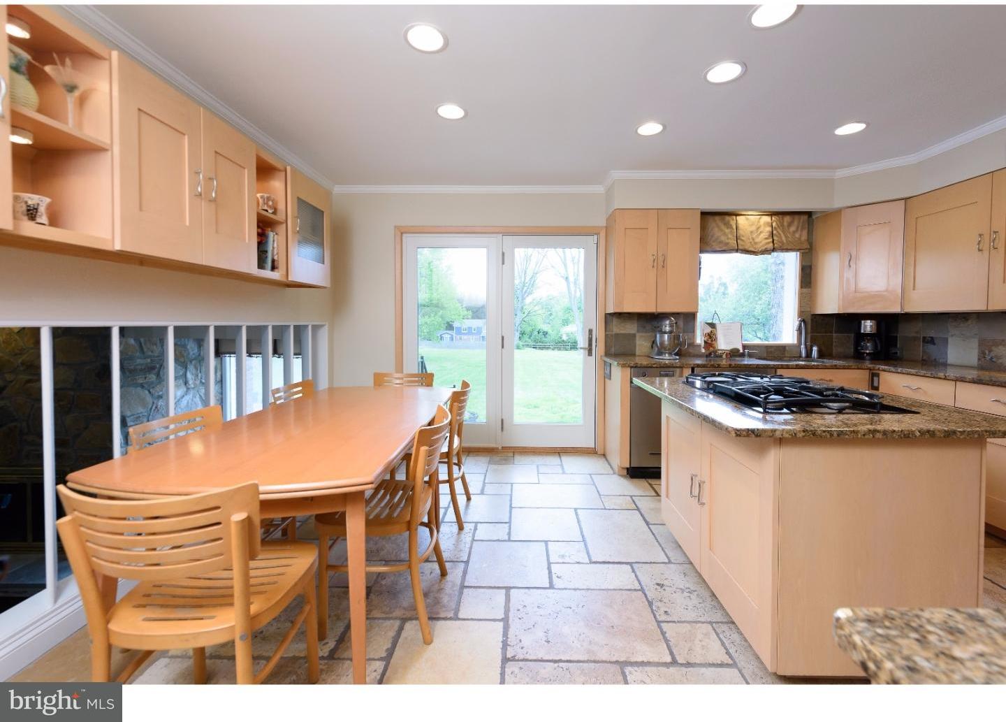 1935 County Line Road Villanova, PA 19085 - Photo 8 of 25 a kitchen with stainless steel appliances granite countertop a stove a sink dishwasher and a refrigerator