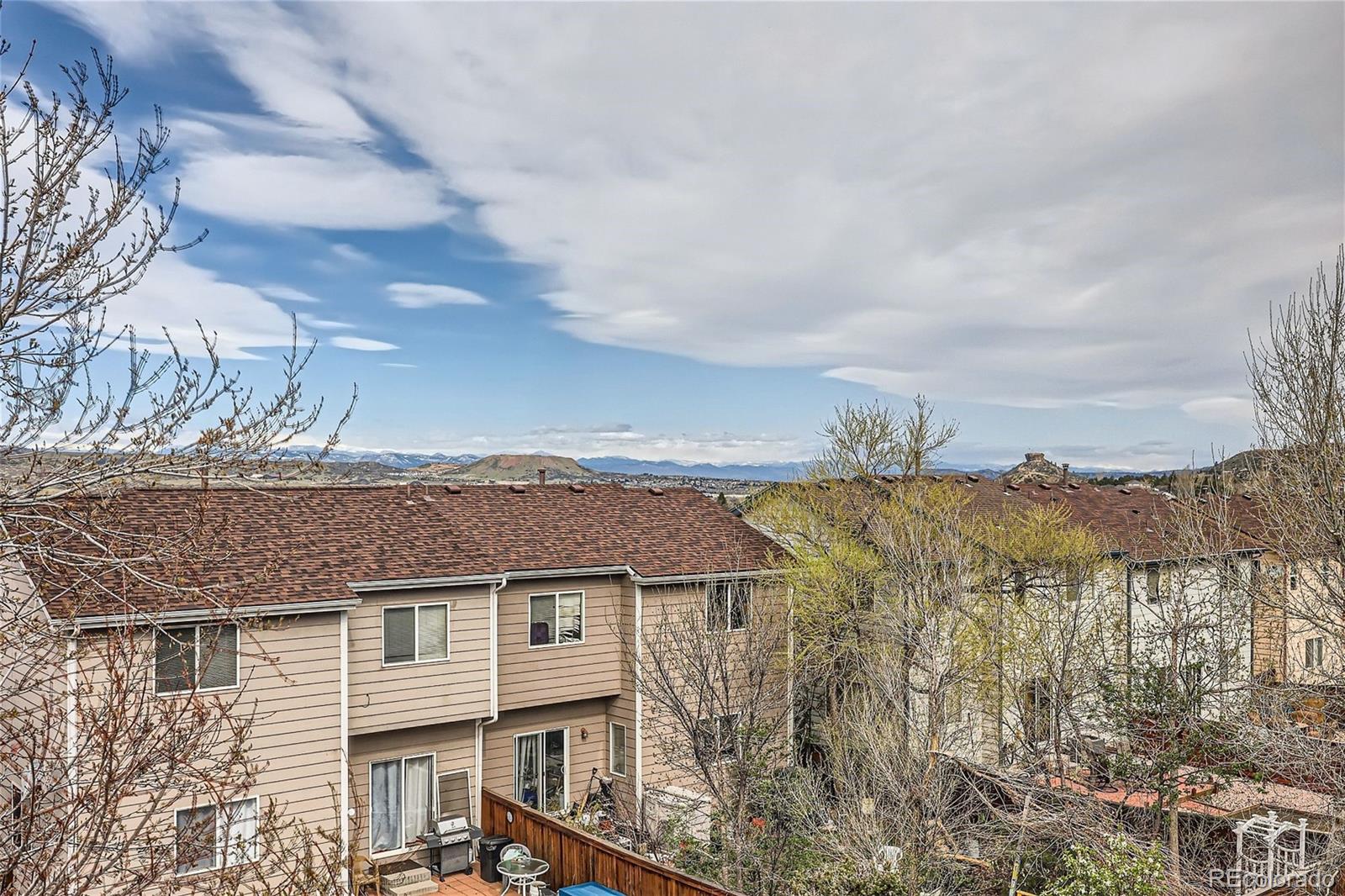 1515 Live Oak Road Castle Rock, CO 80104 - Photo 22 of 26 a view of a house with a yard and balcony
