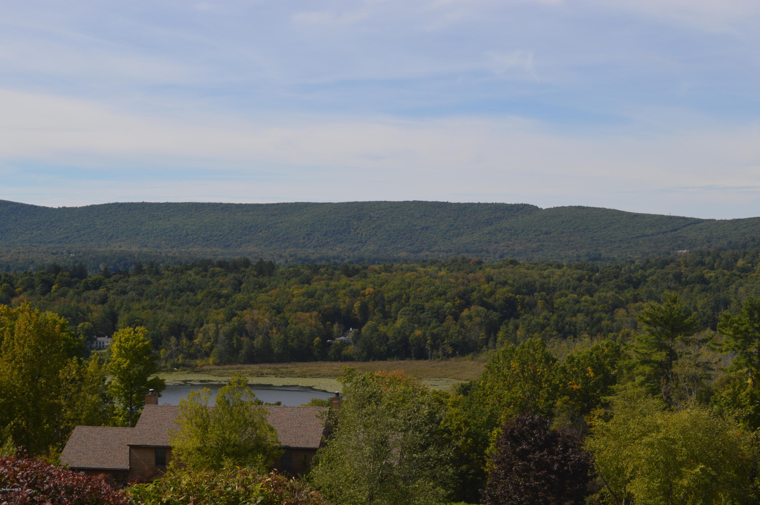 an aerial view of residential house with outdoor space