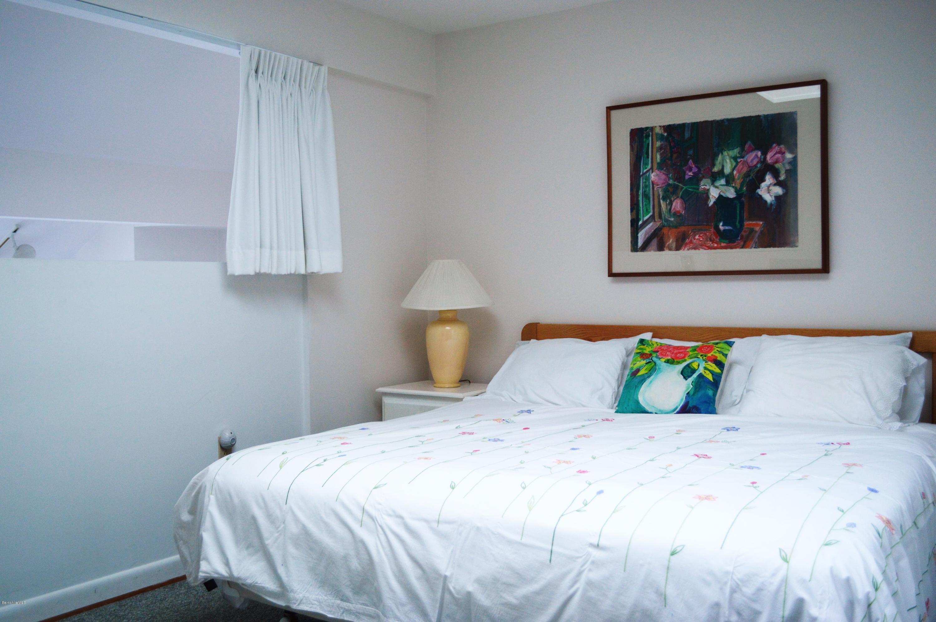 200 Old Stockbridge Road Lenox, MA 01240 - Photo 15 of 30 a bedroom with a bed and a painting on the wall