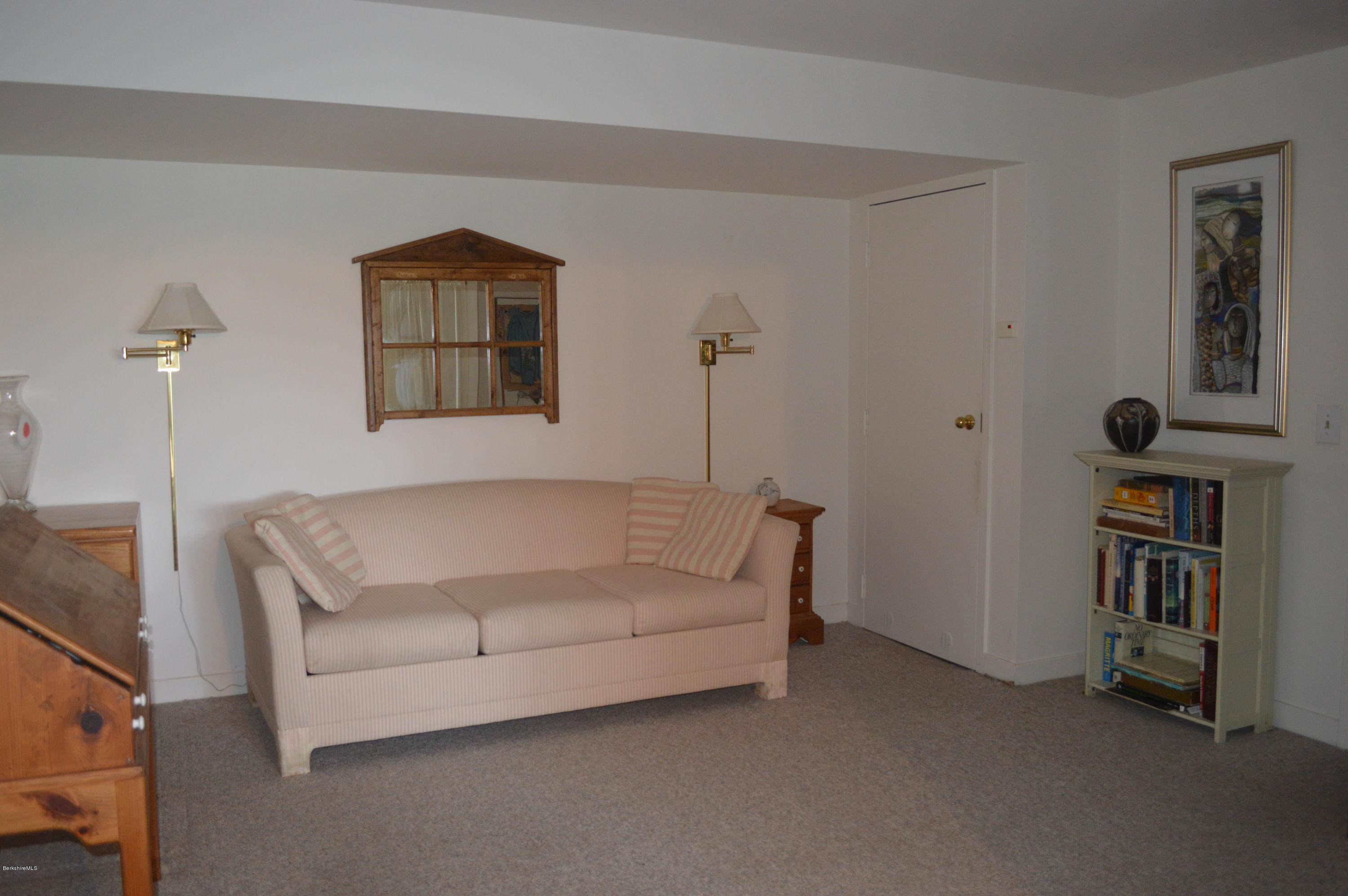 200 Old Stockbridge Road Lenox, MA 01240 - Photo 17 of 30 a living room with furniture and a baby crib