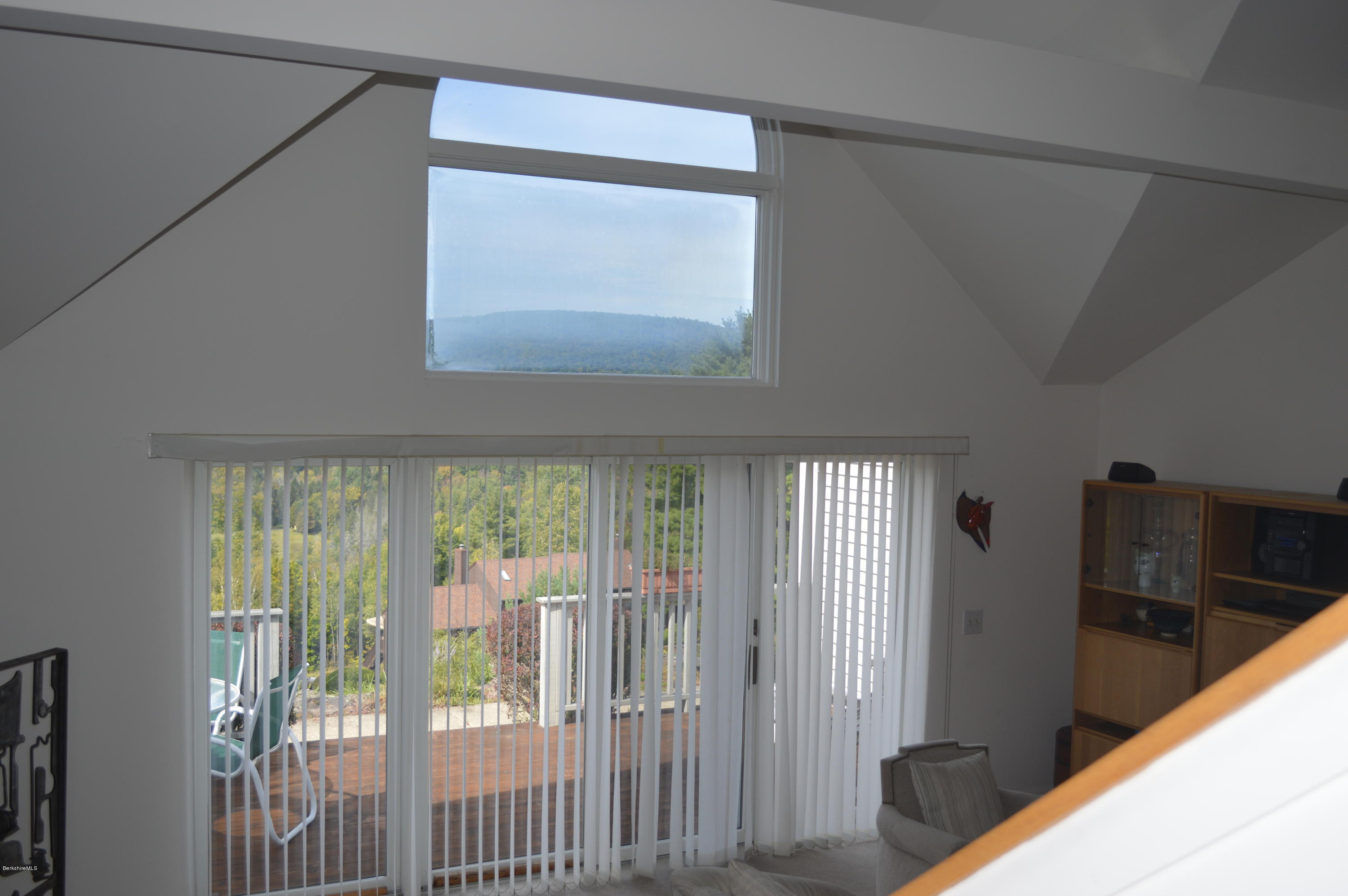 200 Old Stockbridge Road Lenox, MA 01240 - Photo 4 of 30 a view of a glass door and wooden floor