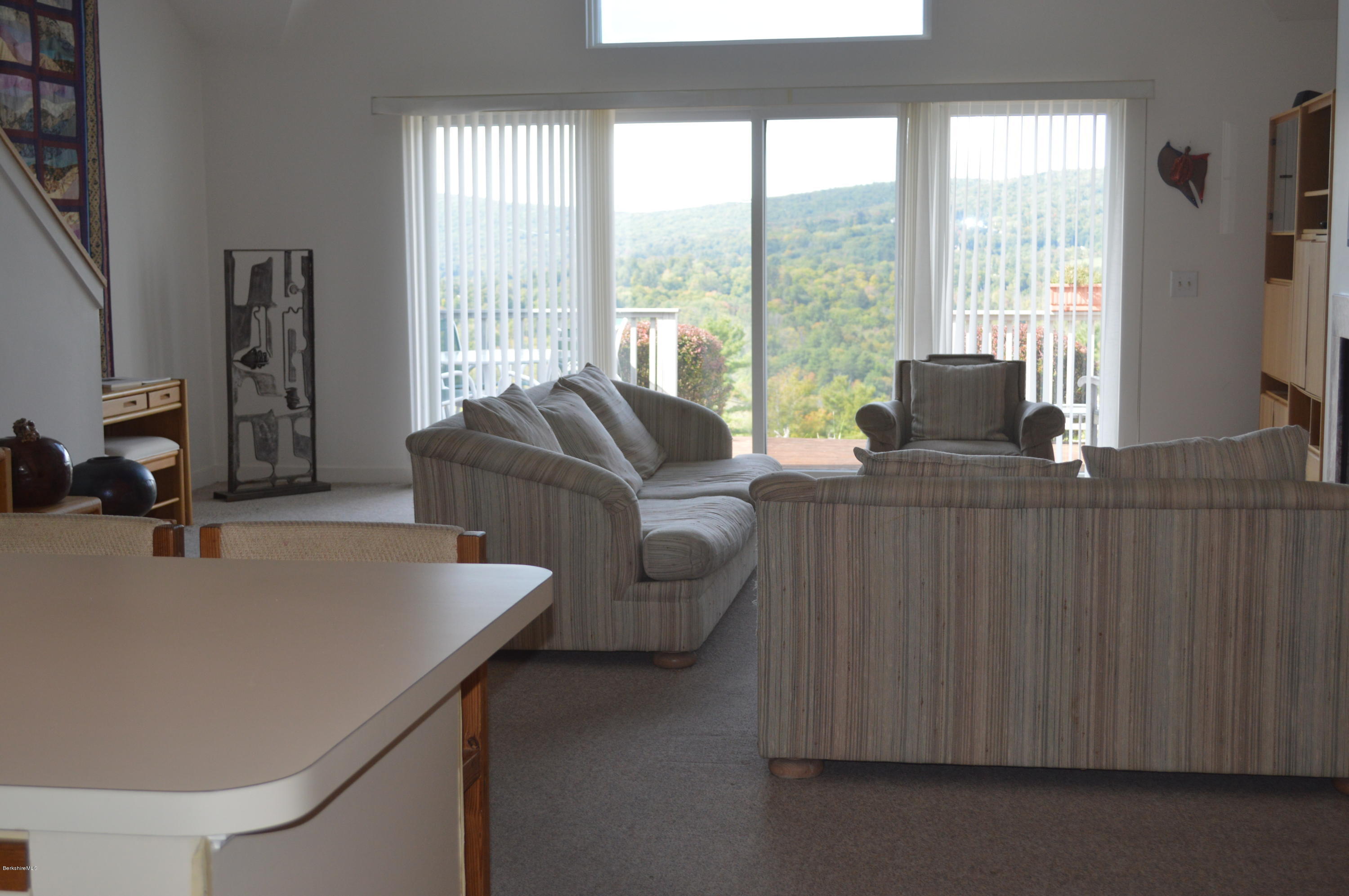 200 Old Stockbridge Road Lenox, MA 01240 - Photo 5 of 30 a living room with furniture and large windows