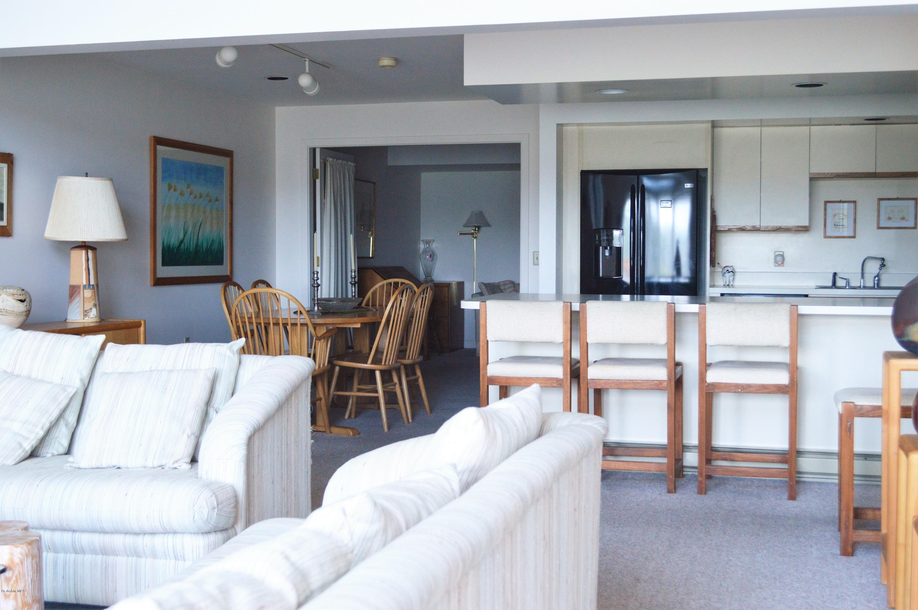 200 Old Stockbridge Road Lenox, MA 01240 - Photo 8 of 30 a living room with furniture and a table