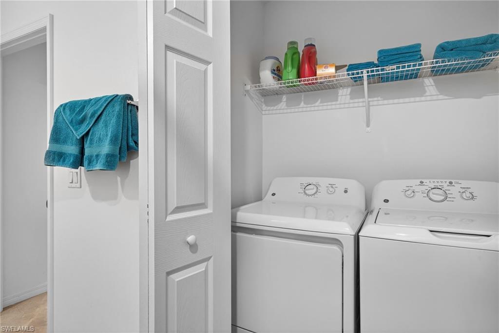 43985 Boardwalk Loop, Unit 2115 Punta Gorda, FL 33982 - Photo 16 of 28 a utility room with dryer and washer