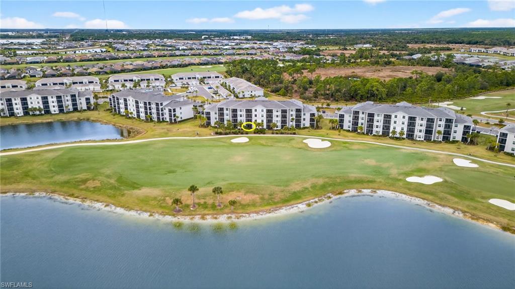 43985 Boardwalk Loop, Unit 2115 Punta Gorda, FL 33982 - Photo 27 of 28 a view of a swimming pool with an ocean view