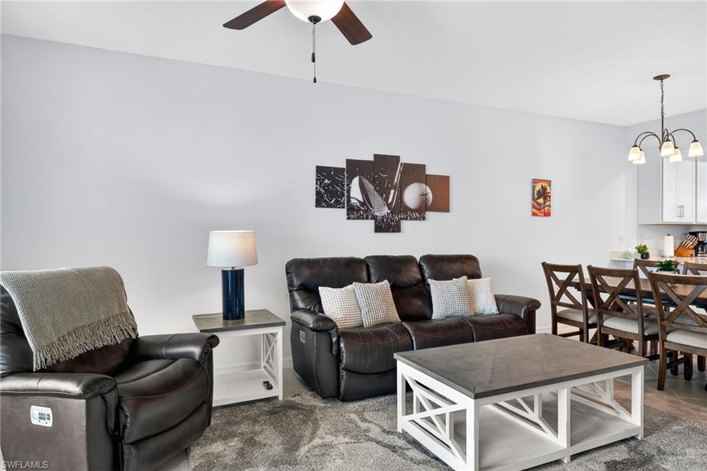 43985 Boardwalk Loop, Unit 2115 Punta Gorda, FL 33982 - Photo 9 of 28 a living room with furniture and a couch
