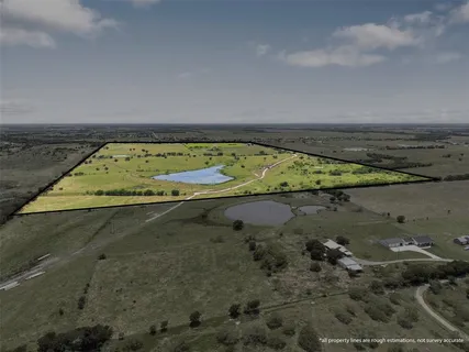 view of a swimming pool with an outdoor seating