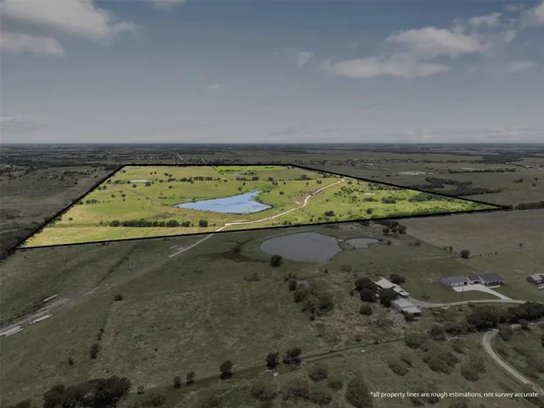 view of a swimming pool with an outdoor seating