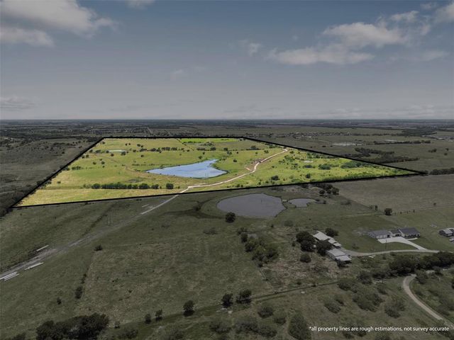 view of a swimming pool with an outdoor seating