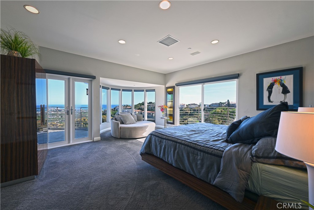 90 Marbella San Clemente, CA 92673 - Photo 16 of 39 a bed room with a bed and a couch