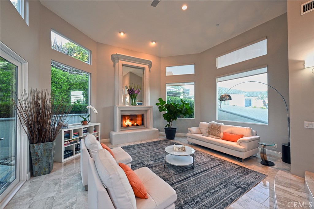 90 Marbella San Clemente, CA 92673 - Photo 7 of 39 a living room with furniture and a potted plant