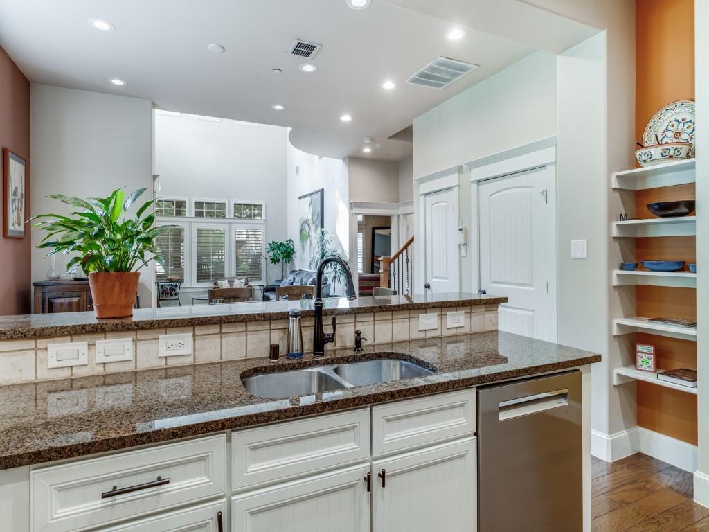 1600 Abrams Road, Unit 30 Dallas, TX 75214 - Photo 12 of 26 a kitchen with stainless steel appliances granite countertop a sink a counter space and a window