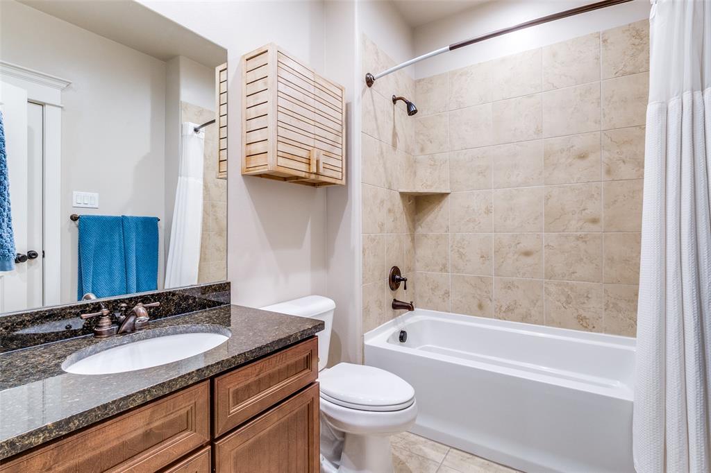 1600 Abrams Road, Unit 30 Dallas, TX 75214 - Photo 24 of 26 a bathroom with a sink and a mirror