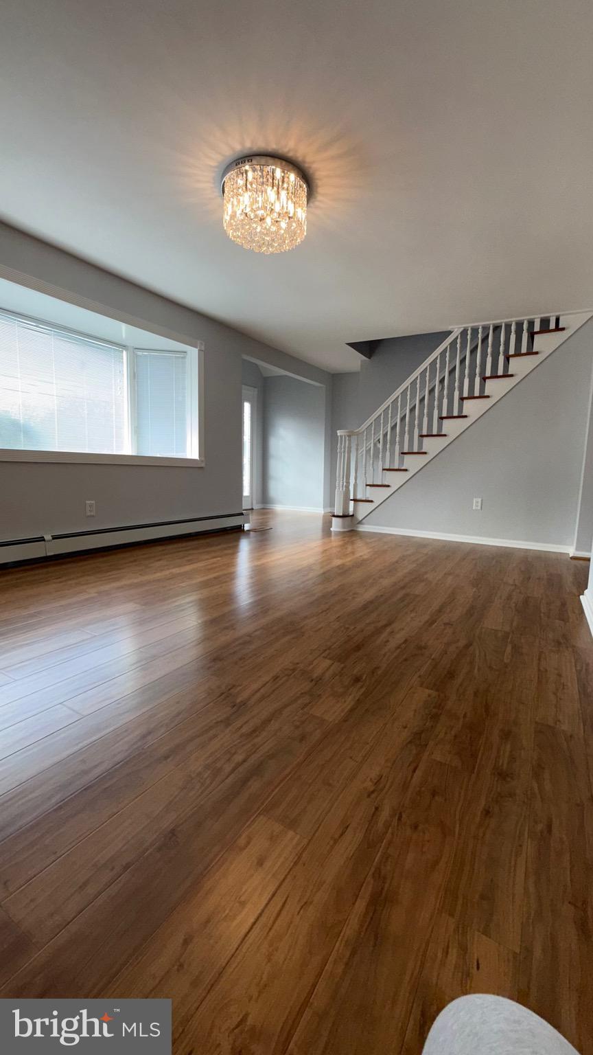 27 3rd Avenue Toms River, NJ 08757 - Photo 15 of 69 a view of a livingroom with wooden floor