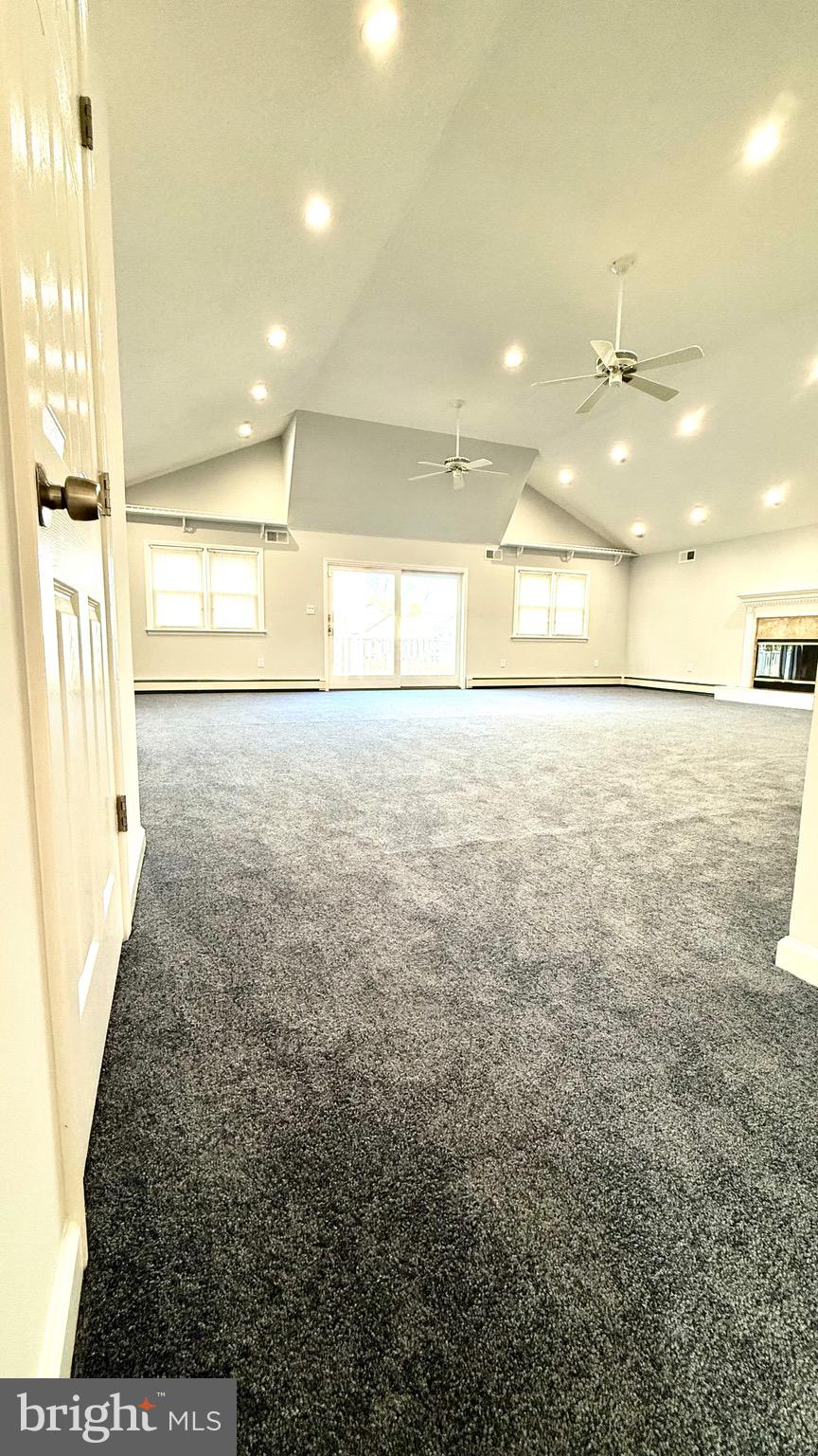 27 3rd Avenue Toms River, NJ 08757 - Photo 24 of 69 a bathroom with a sink and a large mirror