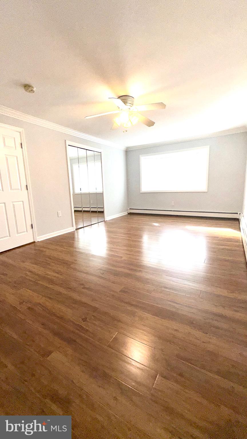 27 3rd Avenue Toms River, NJ 08757 - Photo 30 of 69 a view of empty room with wooden floor
