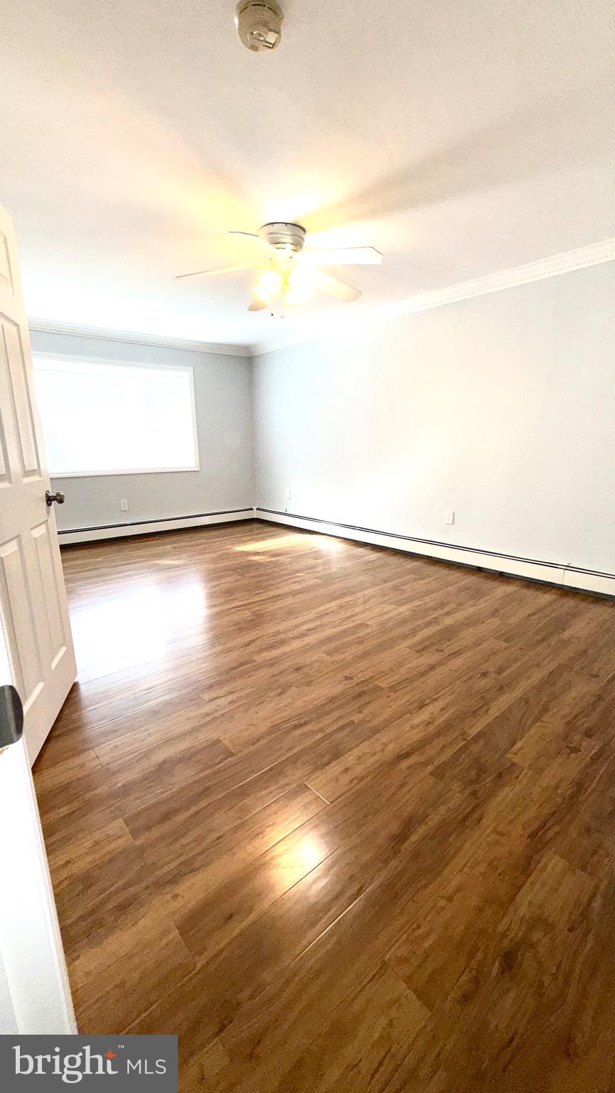 27 3rd Avenue Toms River, NJ 08757 - Photo 31 of 69 a view of empty room with wooden floor