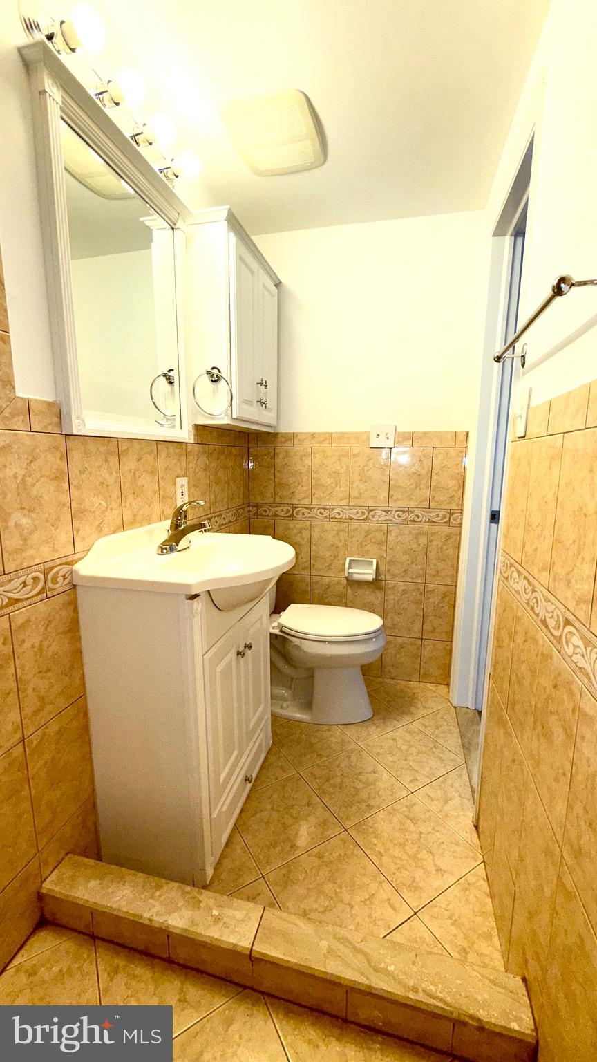 27 3rd Avenue Toms River, NJ 08757 - Photo 32 of 69 a bathroom with a sink toilet and shower