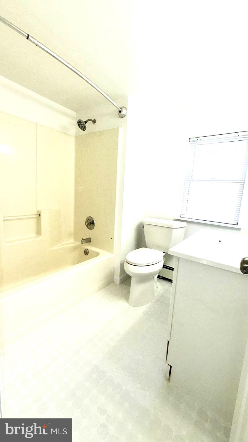 27 3rd Avenue Toms River, NJ 08757 - Photo 43 of 69 a bathroom with a sink and a mirror