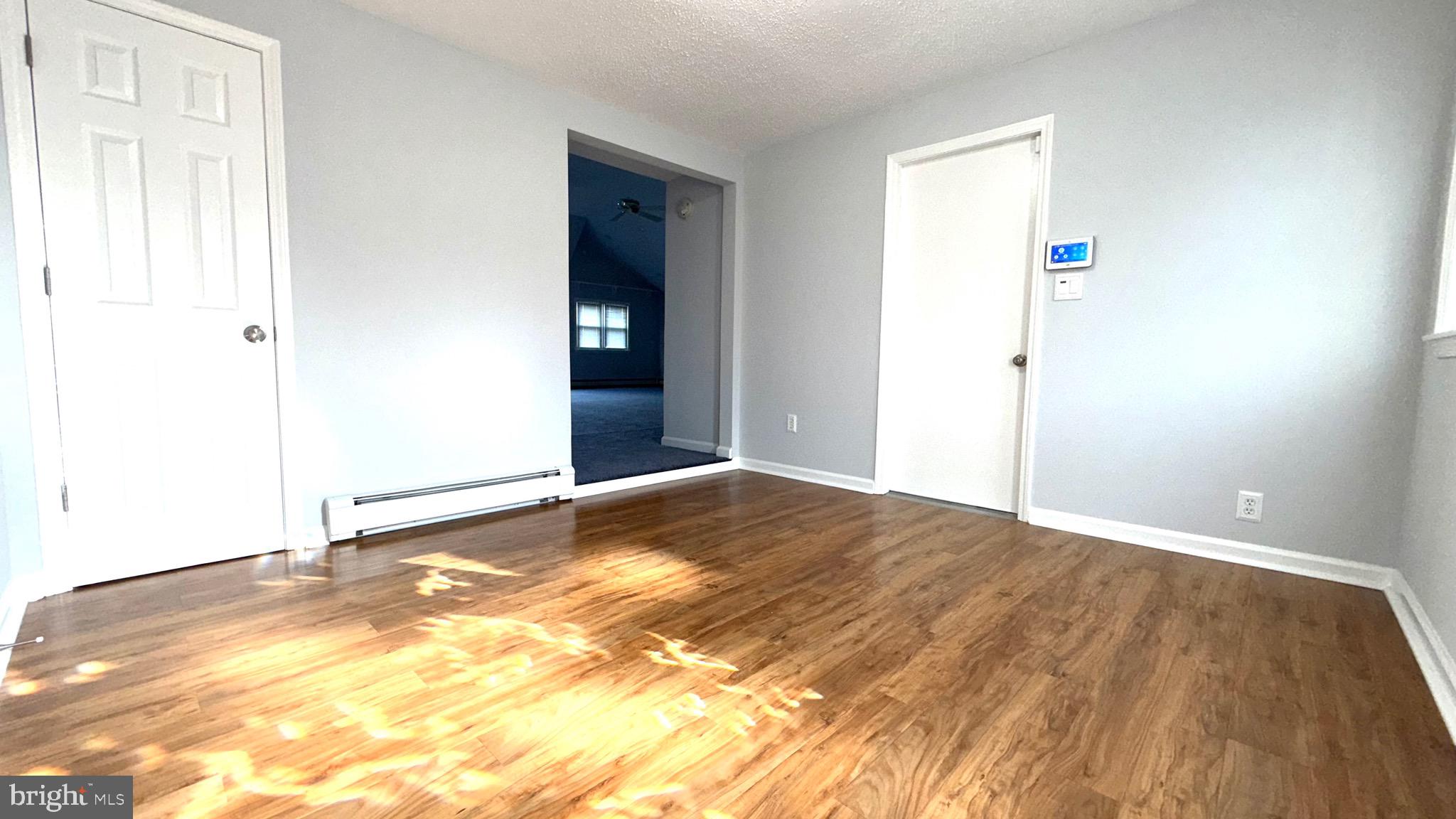 27 3rd Avenue Toms River, NJ 08757 - Photo 6 of 69 a view of an empty room and bedroom