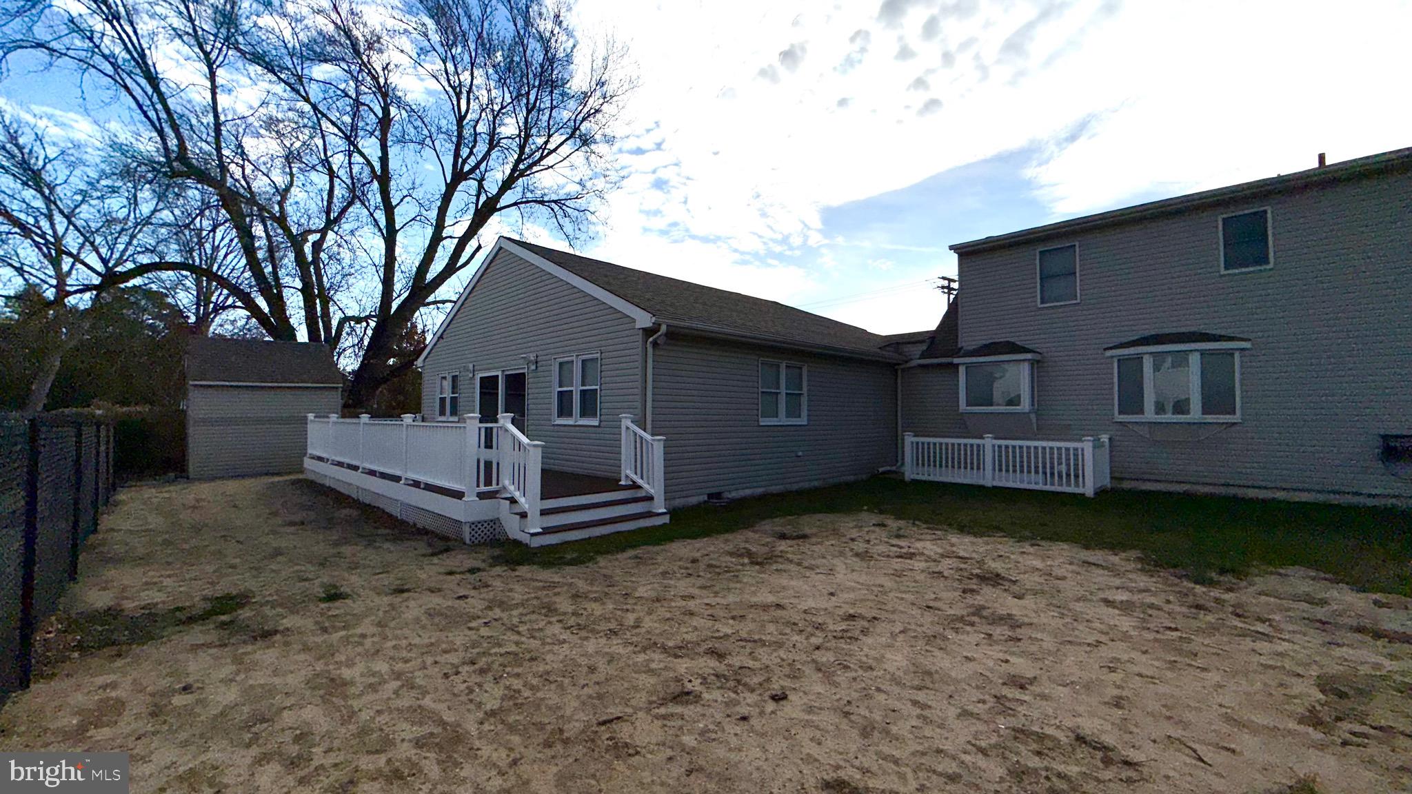 27 3rd Avenue Toms River, NJ 08757 - Photo 68 of 69 a front view of a house with garden