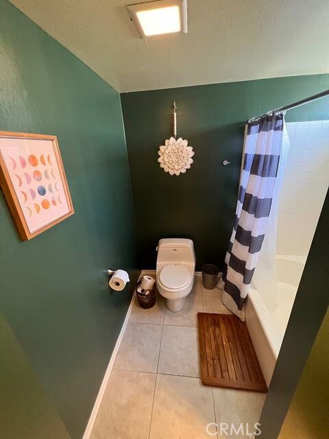 69646 Antonia Way Rancho Mirage, CA 92270 - Photo 33 of 50 a bathroom with a toilet a sink and mirror
