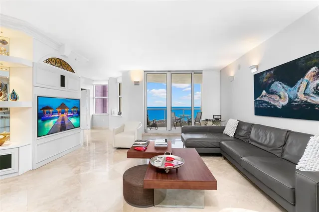 a view of a chairs and table in the patio