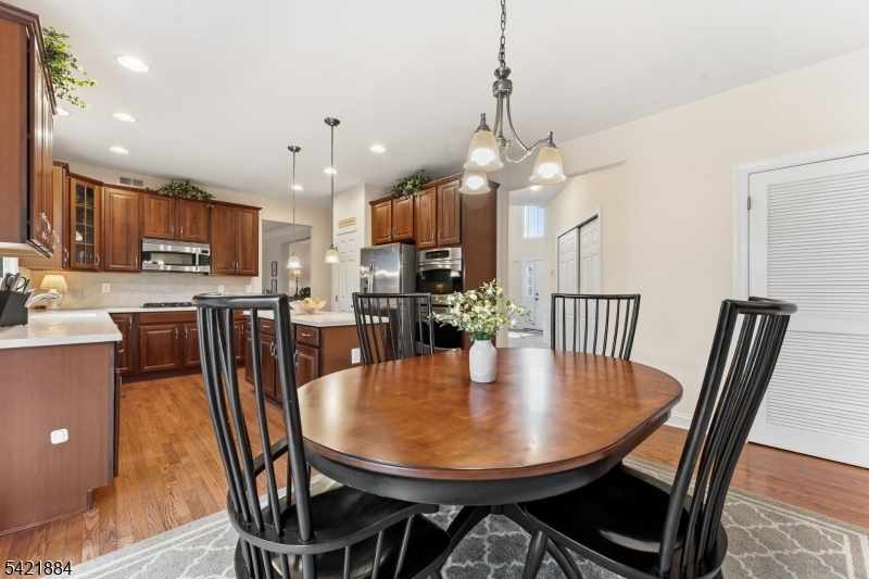 26 Rouser Way Hillsborough, NJ 08844 - Photo 17 of 49 a view of a dining room with furniture