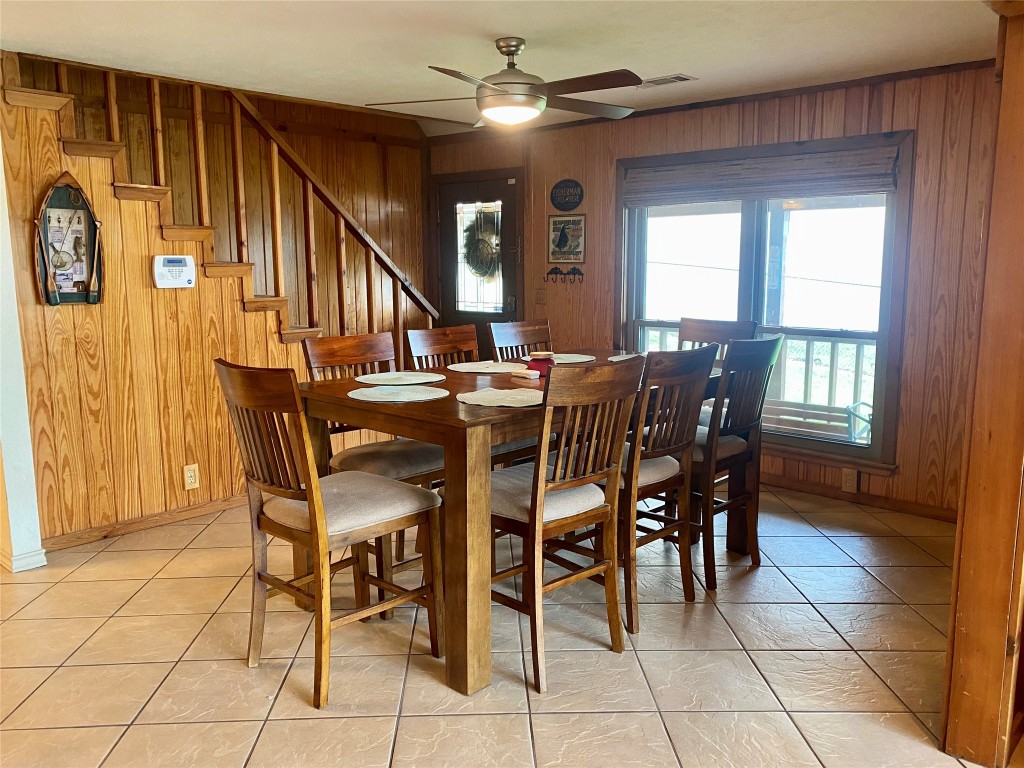 173 Ridgecrest Drive Burkeville, TX 75932 - Photo 14 of 27 a view of a dining room with furniture and chandelier