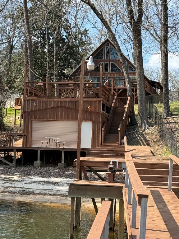 173 Ridgecrest Drive Burkeville, TX 75932 - Photo 6 of 27 a front view of a house with a ocean view