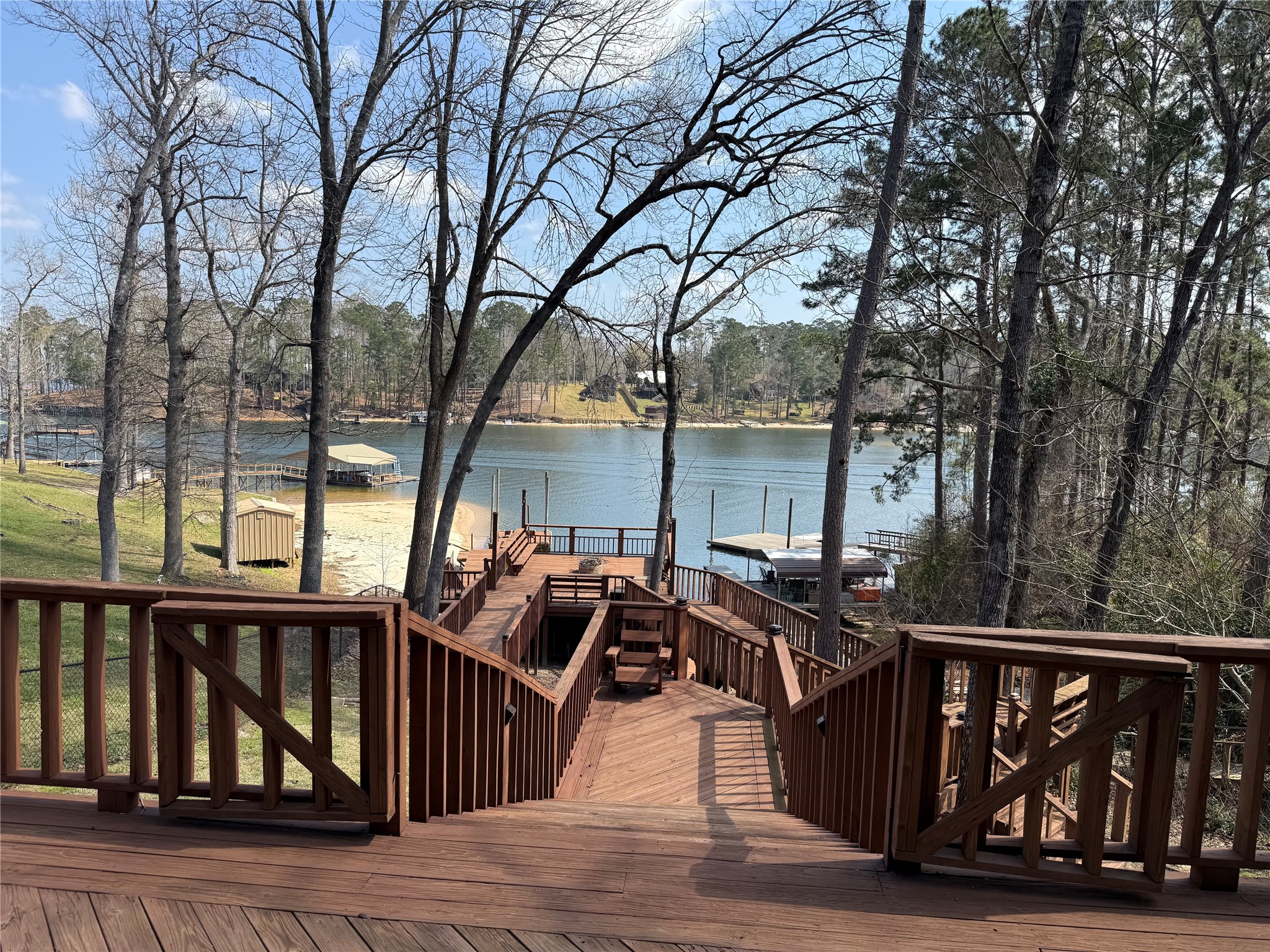 173 Ridgecrest Drive Burkeville, TX 75932 - Photo 8 of 27 a view of a wooden deck and city from the roof