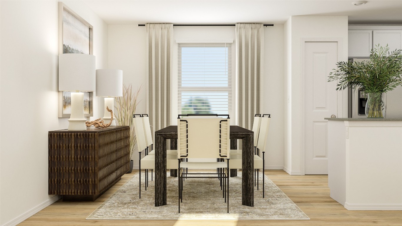 137 Texas Angel Way Jarrell, TX 76537 - Photo 1 of 1 a view of a dining room with furniture and a potted plant