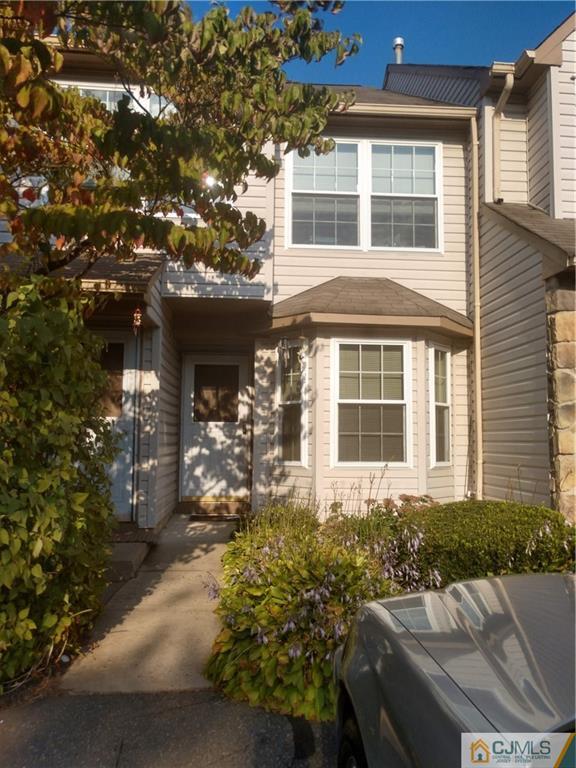 234 Nebula Road, Unit 234 Piscataway, NJ 08854 - Photo 3 of 4 front view of house with a yard