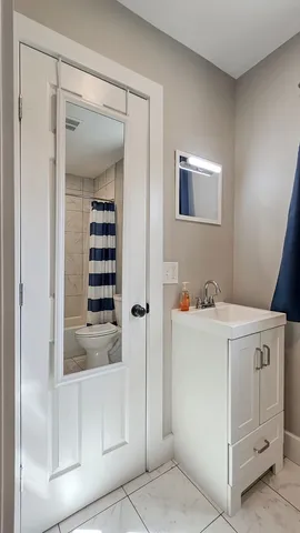 a storage room with washer and dryer