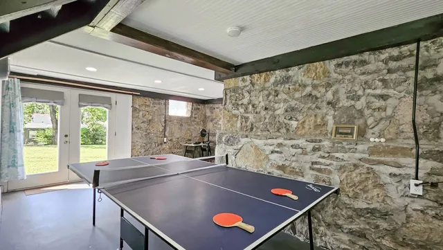 a view of a living room and dining room