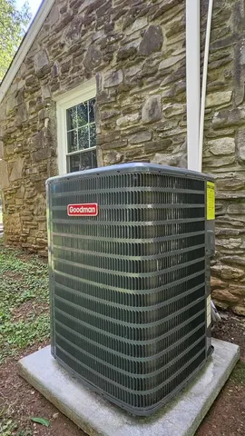 a view of a patio with table and chairs and potted plants