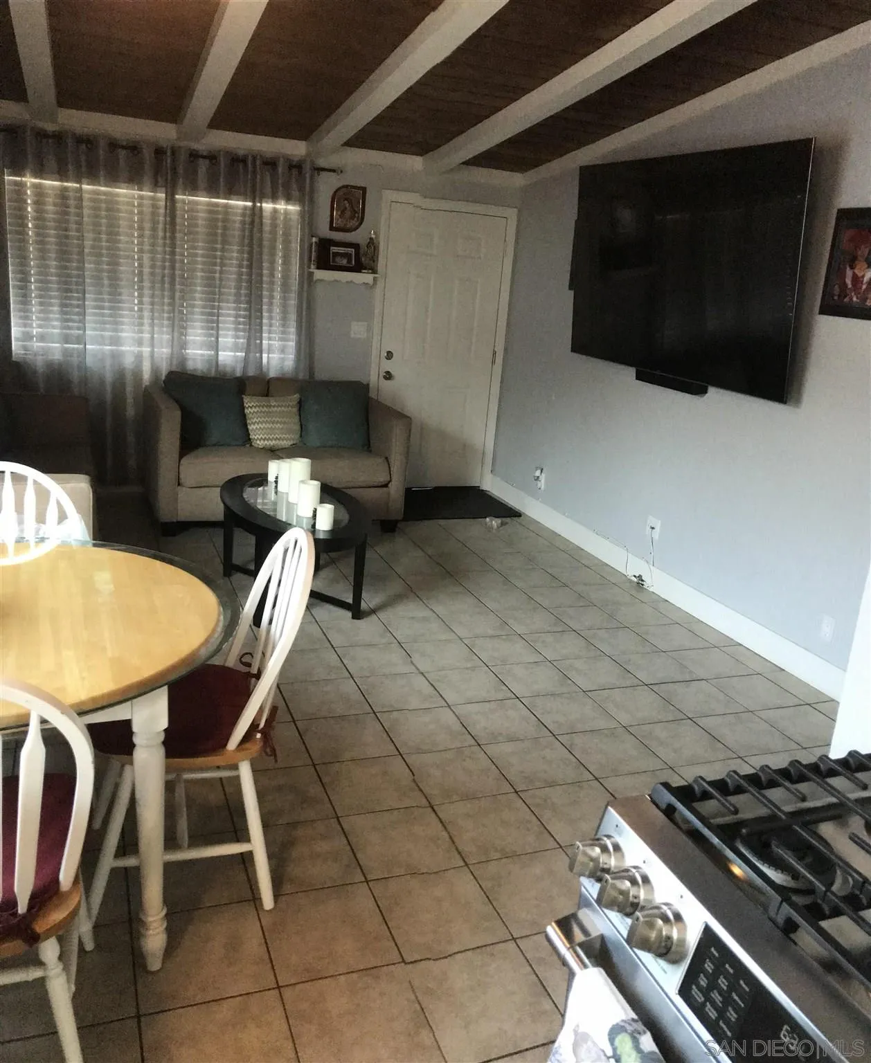 395-397 Eddie Drive Vista, CA 92083 - Photo 15 of 30 a kitchen with a table and chairs
