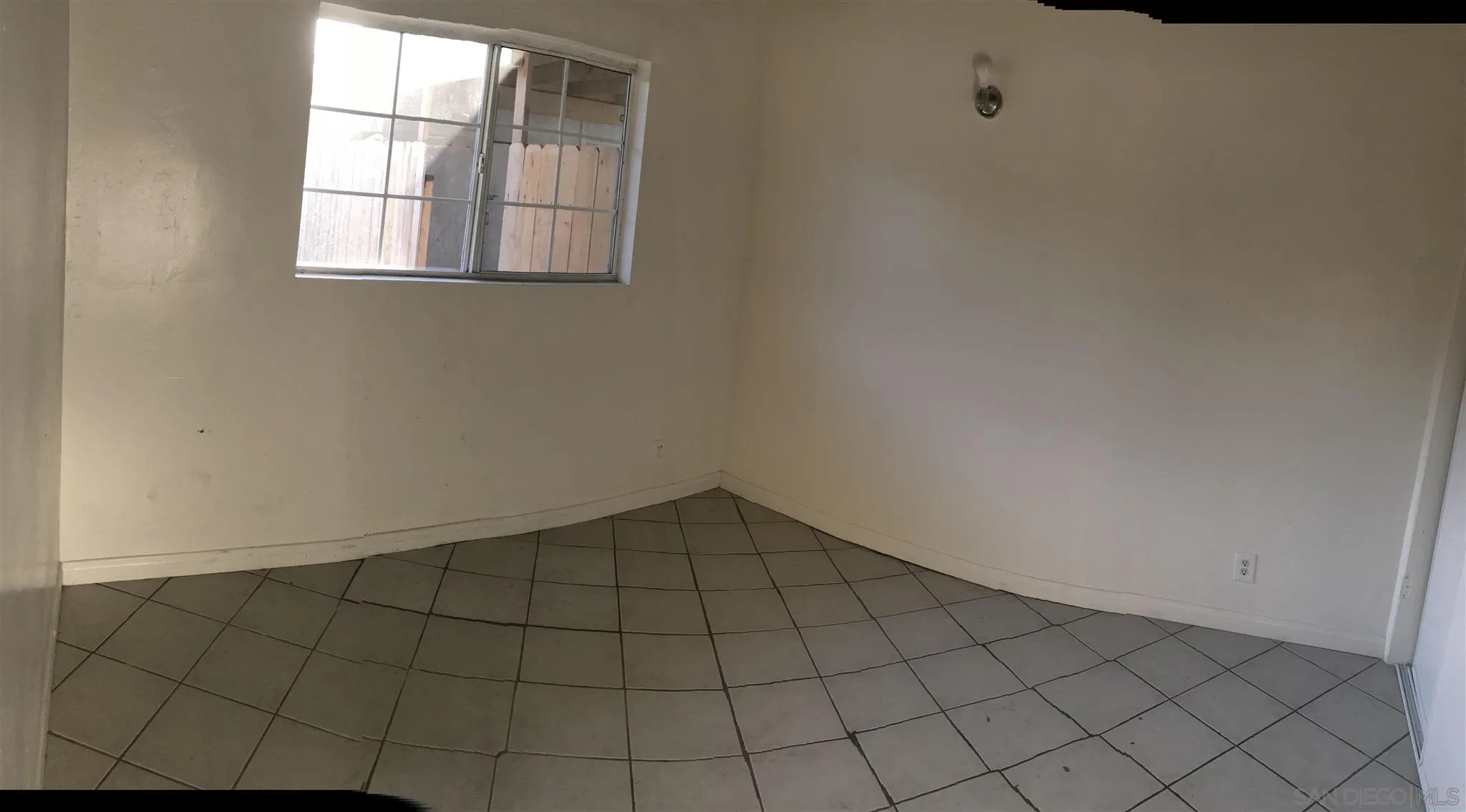 395-397 Eddie Drive Vista, CA 92083 - Photo 24 of 30 a view of an empty room and window