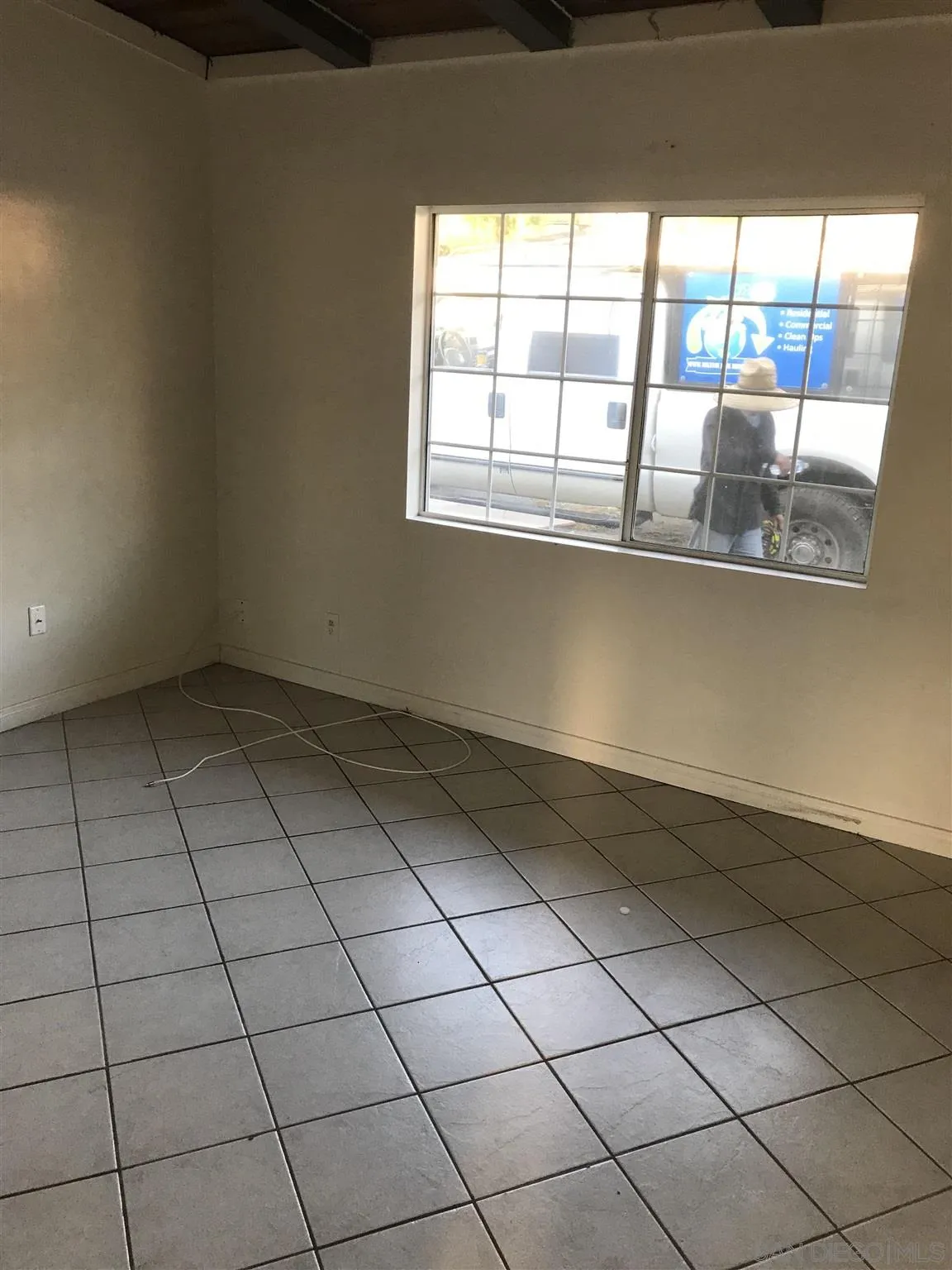 395-397 Eddie Drive Vista, CA 92083 - Photo 26 of 30 a view of an empty room with a window