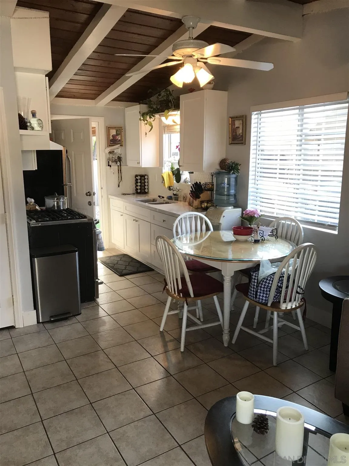 395-397 Eddie Drive Vista, CA 92083 - Photo 9 of 30 a view of a dining room with furniture and a chandelier