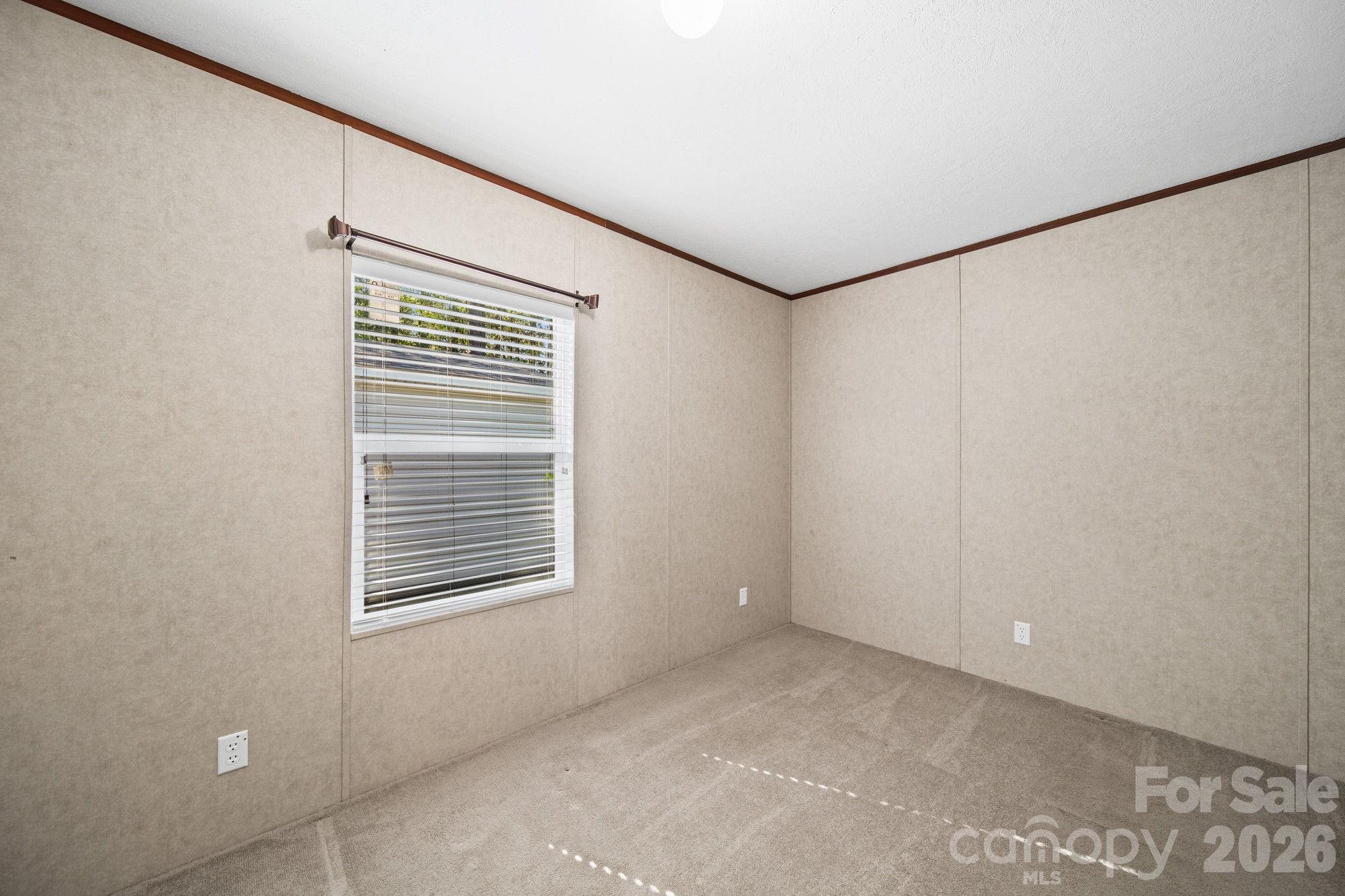 4507 White Store Road Wingate, NC 28174 - Photo 22 of 29 a view of an empty room with a window